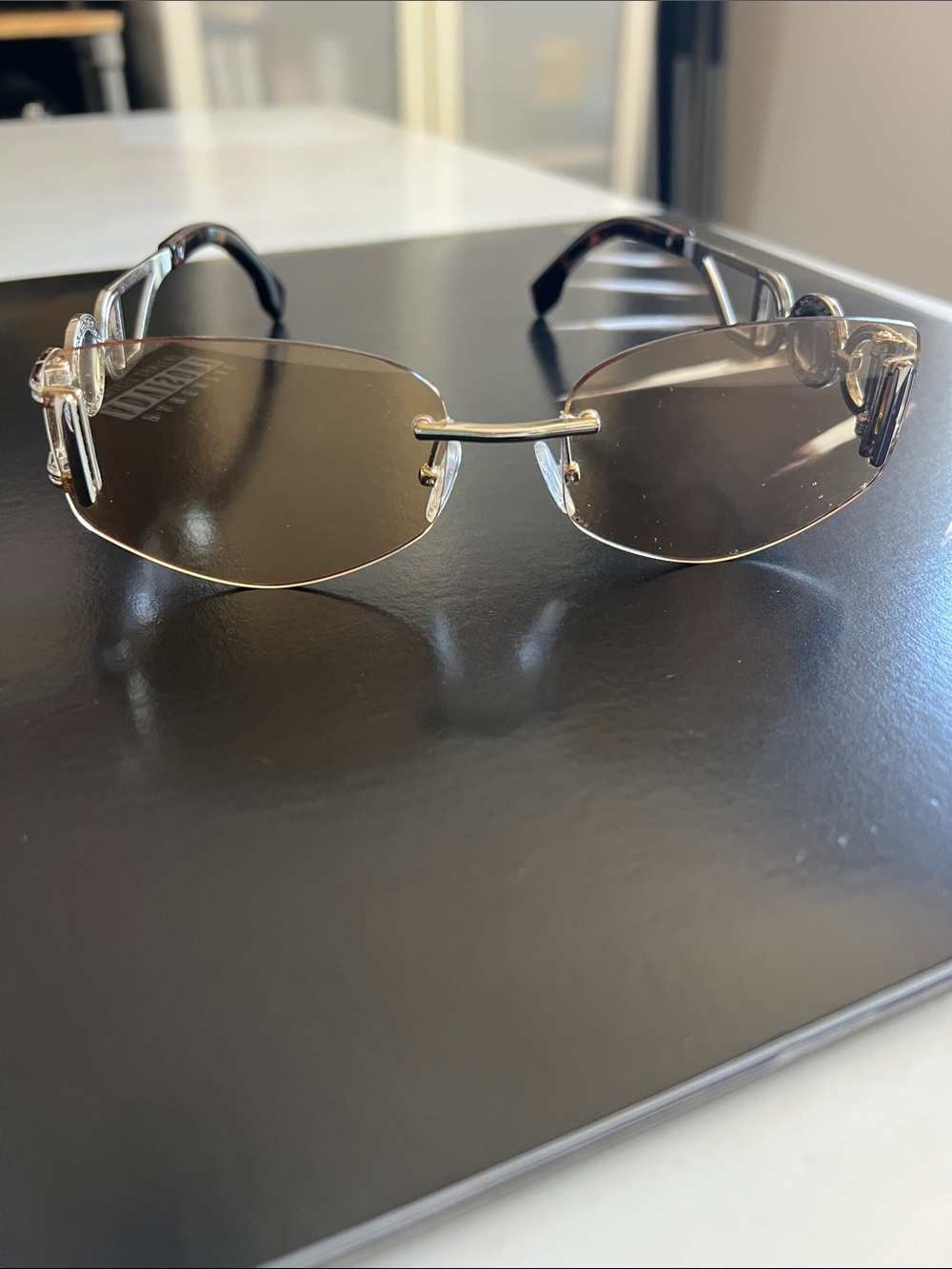 Rimless Y2K Women's Dolce and Gabbana sunglasses